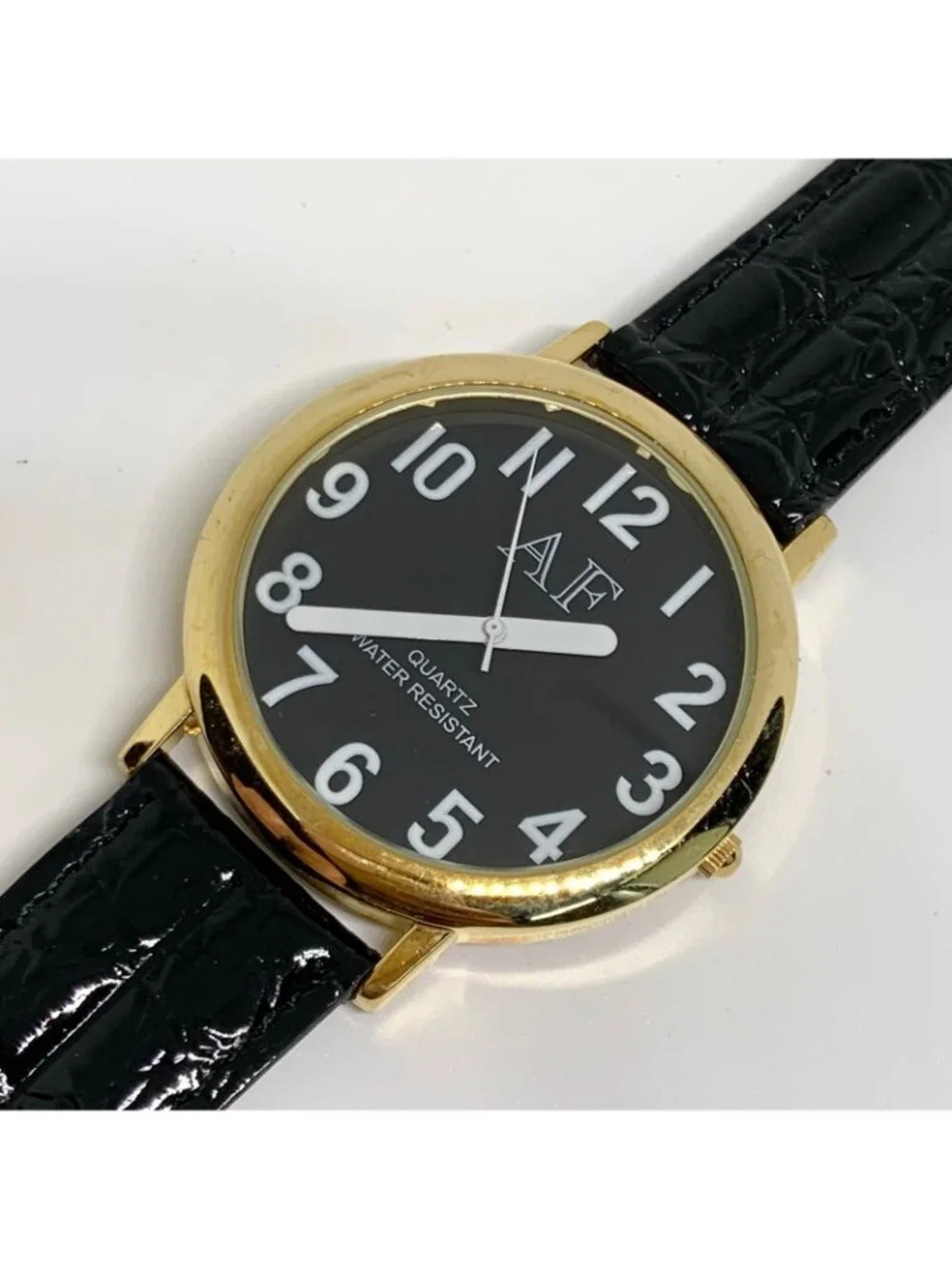 Quartz analog men’s watch gold tone 41mm easy reading black leather running
